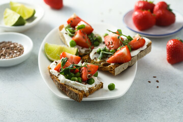 Homemade strawberry bruschetta with green pea