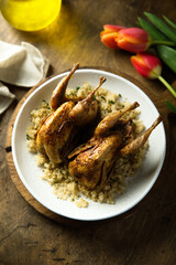 Roasted guinea fowl with couscous