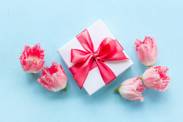 Fift box with pink ribbon. Women mothers day concept