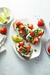 Homemade strawberry bruschetta with green pea