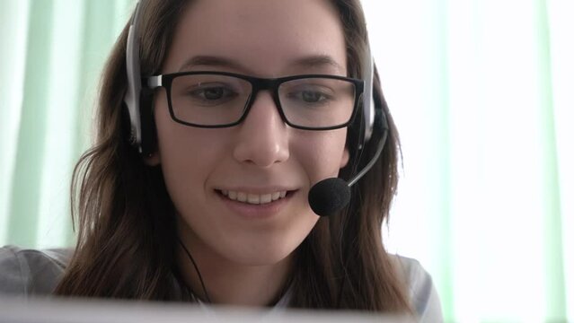 Close-up girl call center operator sells services. Call center. 