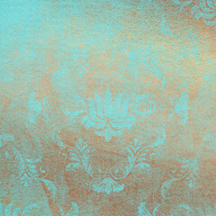 Blue and bronze leather texture with vintage pattern. Scrapbook background