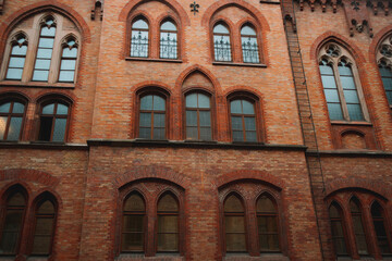 Fototapeta na wymiar Old building with windows. Beautiful landmark in the city of Munich, in Germany. Tourist attraction.