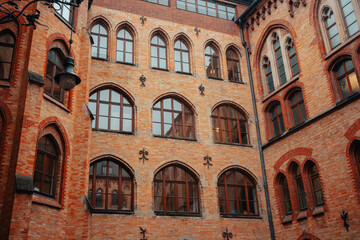Fototapeta na wymiar Old houses in the old town. Beautiful landmark in the city of Munich, in Germany. Tourist attraction.