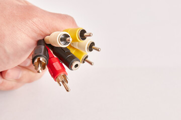 Analog video audio signal cable on white background.