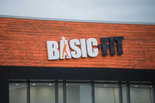 Mulhouse - France - 5 April 2022 - Closeup of basic fit sign on store front in the street