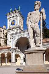 Clock tower and Cacus statue in Piazza della Libert (Freedom Square) Udine, Italy
