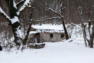 Old abandoned and ruined water mill in Slatna winter edition