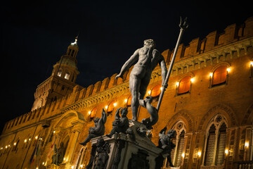 Fountain of Neptune and the Palazzo d'Accursio that is currently the Town Hall of Bologna city - obrazy, fototapety, plakaty