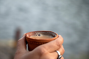 Tea in a traditional natural clay cup known as kullad