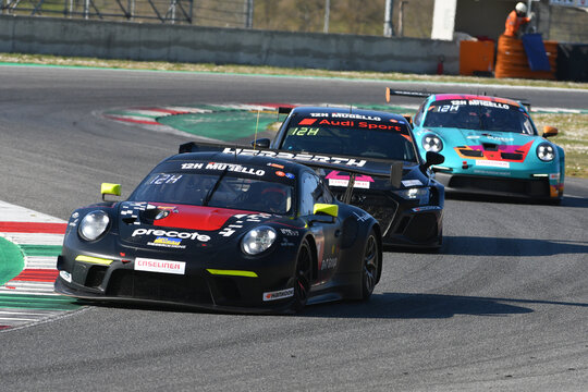 Scarperia, 24 March 2022: Porsche 911 GT3 R (991 II) of Herberth Motorsport Team driven by Daniel Allemann Ralf Bohn Alfred Renauer in action during 12h Hankook Race at Mugello Circuit in Italy.