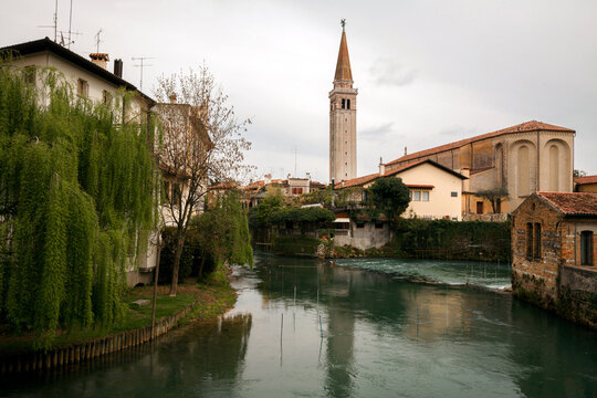 The Livenza river in the centre of town with Chatedral - Duomo di San Nicol - Sacile, Pordenone, Friuli Venezia Giulia, Italy