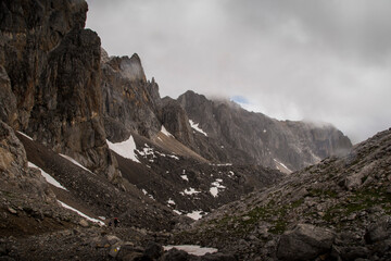 Majestic sharp limestone peaks stand tall amidst the fog