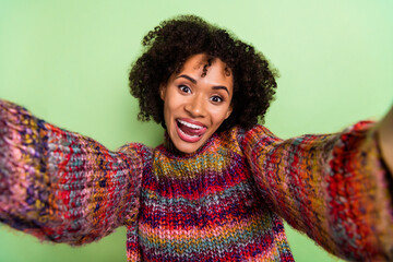 Portrait of positive pretty girl take selfie tongue lick teeth good mood isolated on green color background