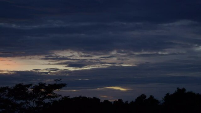 Camera panning over a cloudy sunset in a beautiful valley in Veracruz, Mexico.