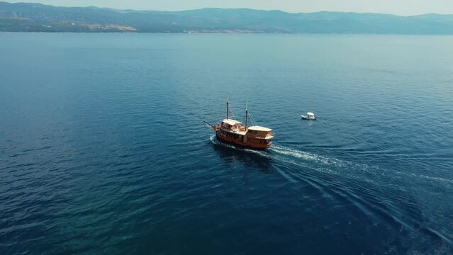 Aerial view of tourist pirate ship on the Croatian coast next to Krk Island
