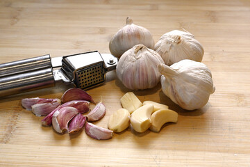 Garlic bulb and garlic cloves, cooking ingredients for many mediterranean dishes 