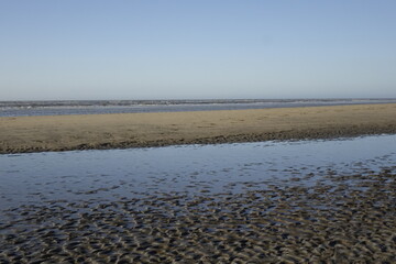 Sandy North Sea beach and ocean at dusk, concept: serenity, holiday, seascape (horizontal), Zandvoort, North Holland, Netherlands