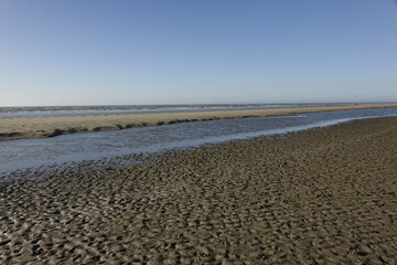 Sandy North Sea beach and ocean at dusk, concept: serenity, holiday, seascape (horizontal), Zandvoort, North Holland, Netherlands