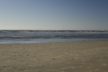 Sandy North Sea beach and ocean at dusk, concept: serenity, holiday, seascape (horizontal), Zandvoort, North Holland, Netherlands
