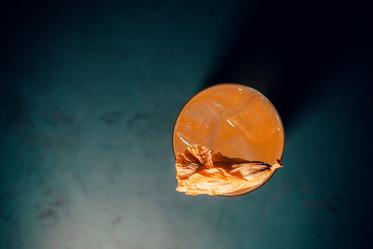 Fresh Passion Fruit Cocktail On A Black Background. Top View