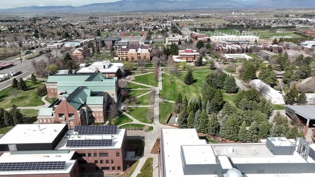 Cinematic 4K aerial drone dolly out shot of the Central Washington University campus in the city of Ellensburg, Kittitas County in Western Washington