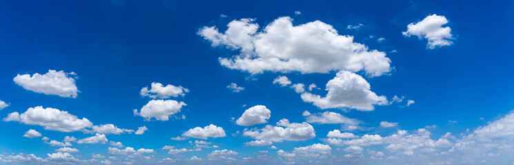 Panorama photo of blue sky background with white clouds