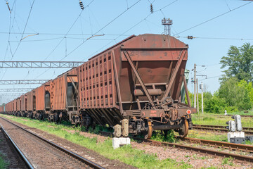 Fototapeta na wymiar Freight railway cars at the marshalling yard