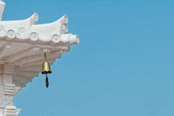 Bell on eaves of Chinese pagoda
