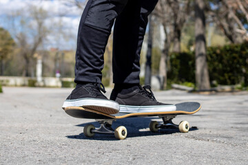 Close-up of a legs on a skateboard 