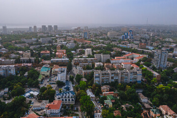 Fototapeta na wymiar Dnipro, Ukraine. View of the central part of the city, the embankment of the Dnieper. Top view from a great height. Panoramic view of the city. Right bank of the city