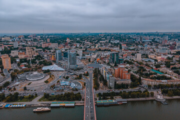 Fototapeta premium Dnipro, Ukraine. View of the central part of the city, the embankment of the Dnieper. Top view from a great height. Panoramic view of the city. Right bank of the city