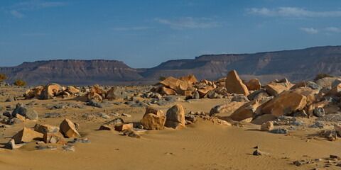 West Africa. Mauritania. Stone placers in the hot sands of the Southwestern outskirts of the Sahara...