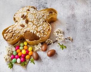 Traditional Italian Easter Dove Bread Colomba , Chocolate Easter Eggs and Cherry Blossoms 