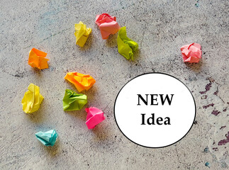 New idea concept with crumpled colorful sticky notes  as a frame 