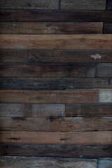 ฺBackground and textured of old wooden slats stacked together. for wall background.