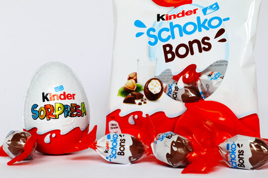 Italy April 6 2022 Kinder Surprise Chocolate Eggs and Schoko Bons. Kinder is a brand of food products of Ferrero Stock Adobe Stock
