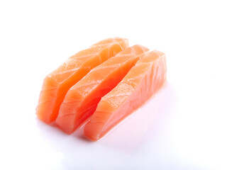 three pieces of raw salmon sashimi sushi japanese food close up cut isolated on white background