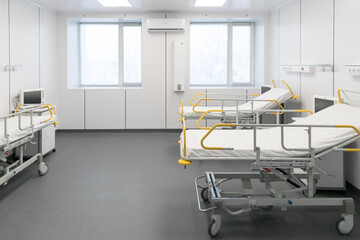 Recovery room with beds and comfortable medical equipment. Interior of an empty hospital room. Clean and empty room with a bed in a new medical center