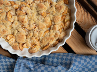 Freshly homemade apple pie/ apple crumble/ apple tart on wodden table  | top view