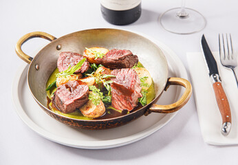 Fillet mignon beef steak with potato on a plate