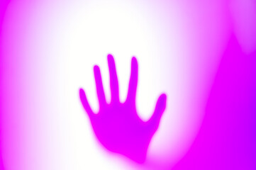 Ghost shadow of hand behind frosted glass, Violence, fear, horror halloween trapped and panic concept, faceless person, Abstract blur hands silhouettes, blurry and soft focus, purple, violet a magenta