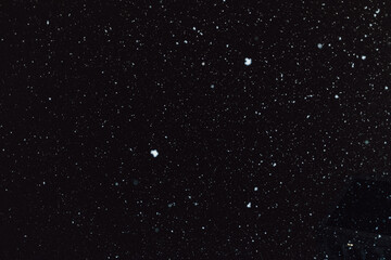  Abstract background. White dots on a black background. Space. Snow. High quality photo