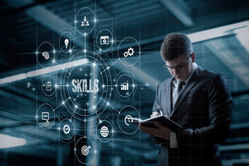 Businessman working on virtual computer screen with skills .