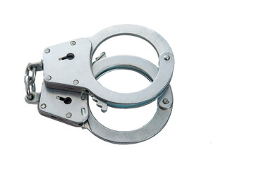Obraz premium Metal handcuffs on a white isolated background, copy space