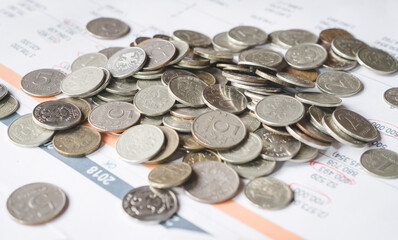 Russian rubles coins pile up on an investor's desk