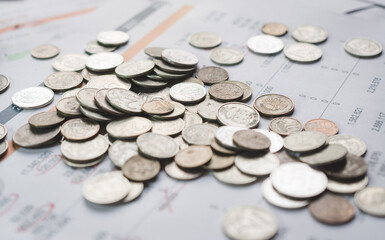 Russian rubles coins pile up on an investor's desk