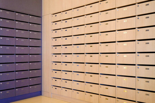 Perspective view of physical wooden mail box for letters
