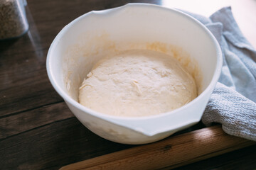 Yeast dough in a bowl. High quality photo