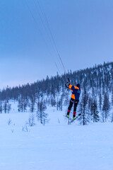 kiting in the winter mountains in russia